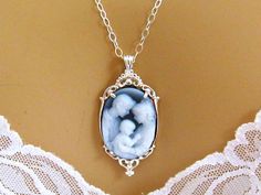 This is so sweet - makes a great gift for first time Mom! Carved Agate Cameo Mother Father Child Necklace/Real Cameo Necklace/Family Cameo Necklace/New Mom Necklace Gift Idea/Victorian Cameo Jewelry by mwhitejewelry on Etsy Valentino Gifts, Victorian Mother, Victorian Cameo, Gold Money, Mother Child, Family Necklace, Cameo Jewelry, Punk Jewelry, Kids Necklace