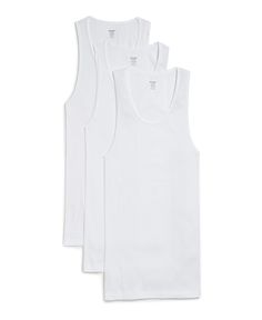 PRICES MAY VARY. Body-confident design for a lean, contoured fit Scoop neck and sleeveless construction Rib-knit tank top Extended hem Sleeveless Undershirt Tank Top, Mens Undershirts, Body Conscious, Mens Essentials, Cotton Tank Top, Knitted Tank Top, Fit Style, Knit Cotton, Knit Tanks