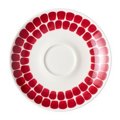 a red and white plate with circles on it