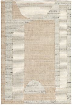 a beige and white rug with an oval design on the bottom, in different colors