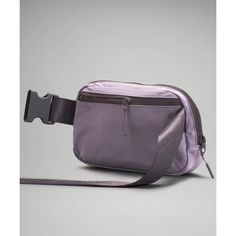 Phone, keys, wallet. Keep them close in this versatile belt bag that helps you get out the door and on to your next adventure. Designed for On the Move. Dimensions: 19 cm x 5 cm x 13 cm (7.5" x 2" x 5"):Volume: 1L. Zippered pockets. Easy-access, exterior pocket for your essentials. Interior pocket. 'Spot clean', 'Do not wash', 'Do not bleach', 'Do not tumble dry', 'Do not iron', 'Do not dry clean', 'Imported'. Water-Repellent Fabric. Mesh: 100% Polyester. Lining: 100% Polyester. Body: 100% Nylon Purple Belt, Lululemon Everywhere Belt Bag, Everywhere Belt Bag, Black Granite, Water Repellent Fabric, Bags Purses, Gift Accessories, Bag Straps, Belt Bag