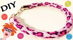 a pink and purple braided keychain with buttons on it