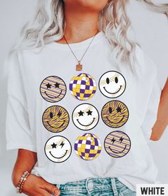 This Comfort Colors retro graphic tee and Gildan graphic sweatshirt features a LSU baseball themed smiley face and disco ball grid design in Louisiana State University colors. ✩ ✩ 𝗞𝗶𝗱𝘀 𝗖𝗼𝗺𝗳𝗼𝗿𝘁 𝗖𝗼𝗹𝗼𝗿𝘀 𝗧𝗲𝗲: https://starrieapparel.etsy.com/listing/1739436679 ✩ 𝗞𝗶𝗱𝘀 𝗦𝘄𝗲𝗮𝘁𝘀𝗵𝗶𝗿𝘁: https://starrieapparel.etsy.com/listing/1739436679 LSU Baseball Shirt Smiley Face Retro Graphic Tee Louisiana State University Tshirt Womens LSU Sweatshirt Lsu Tigers Gift LSU Game Day Outfit Character Print Crew Neck Top For College, Casual Funny Print Tops For College, Funny White T-shirt With Smiley Face, Fun Crew Neck Top For Game Day, Fun Screen Print Tops For Game Day, Fun Screen Print Top For Game Day, Fun Game Day Top With Screen Print, White Smiley Face Graphic Tee, White Graphic Tee With Smiley Face