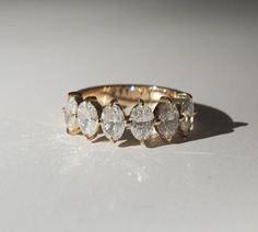 three diamond rings sitting on top of each other