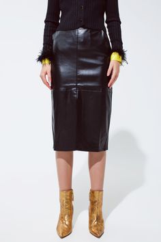 Embrace sophistication and edgy style with our Urban Chic Black Faux Leather Pencil Skirt. This stunning piece is a must-have for fashion-forward individuals looking to make a statement at any occasion or event. Model’s Size and Fit: Showcased by our graceful model in a size S, the skirt provides a perfect fit for her measurements of 31-23-35 and a height of 5'10''. Designed with precision, the skirt offers a true-to-size fit, ensuring both comfort and style. Luxurious Fabric Blend: Crafted from Pencil Cut Skirt, Unique Skirt, Unique Skirts, Faux Leather Pencil Skirt, Leather Pencil Skirt, Faux Leather Skirt, Urban Chic, Party Looks, Cut Design