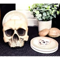 there is a skull and plate on the table