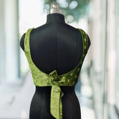 Green Backless Top With Tie Back, Green Tie Back Backless Top, Green Tie-back Backless Top, Green V-neck Formal Blouse, Fitted V-neck Blouse With Tie Back, Fitted Green Top For Wedding, Party Green Padded Blouse Piece, Fitted Green Blouse Piece For Party, Green V-neck Festive Blouse