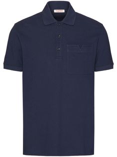 Valentino Ready To Wear navy blue cotton polo collar front button placket short sleeves chest patch pocket The full look includes Valentino Garavani accessories. Blue Top With Pockets And Collared Neckline, Blue Collared Top With Pockets, Classic Blue Polo Shirt With Pockets, Blue Cotton Polo Shirt With Placket, Blue Polo Shirt With Collar And Placket, Blue Polo Shirt With Collar Placket, Blue Polo Shirt With Collar, Navy Polo Collar Top With Pockets, Navy Short Sleeve Polo Shirt For Work