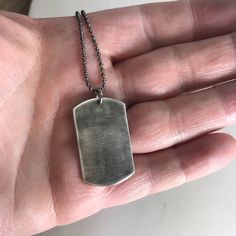 "This signature dog tag necklace is an excellent gift because your actual handwriting jewelry will be cherished for many years. Engrave the signature of your loved one on this sterling silver dog tag necklace. Just send a clear photo (free from shadows, stray marks or folds) and have it engraved into sterling silver. Choose to have one or both sides engraved with the words of someone you love. This pendant measures 1.25 inches x 3/4\". Other sizes or shapes are available as well. Just send me a Silver Hypoallergenic Dog Tag Jewelry, Hypoallergenic Sterling Silver Dog Tag Jewelry, Hypoallergenic Silver Dog Tag Jewelry, Sterling Silver Dog Tag Jewelry For Anniversary, Silver Hypoallergenic Necklace For Father's Day, Engraved Sterling Silver Dog Tag Necklace, Personalized Sterling Silver Dog Tag Jewelry, Personalized Dog Tag Jewelry For Memorial, Classic Dog Tag Jewelry As Gift