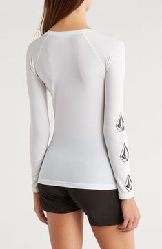 Long sleeves extend your comfort in the sun in this rashguard made from a quick-drying fabric with plenty of stretch to keep you moving. 24 1/2" length (size Medium) Crewneck Long sleeves UPF 50+ sun protection 86% polyester, 14% elastane Hand wash, line dry Imported White Stretch Rash Guard With Crew Neck, Stretch Crew Neck Rash Guard With Upf 50+, Stretch Rash Guard With Upf 50+ And Crew Neck, White Stretch Crew Neck Rash Guard, Casual Stretch Tops For Water Sports, Surfing Moisture-wicking Stretch Tops, Moisture-wicking Stretch Tops For Surfing, White Sports Rash Guard With Uv Protection, Fitted Crew Neck Rash Guard For Surfing