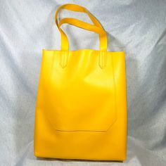 Saks Fifth Avenue Large Yellow Tote Bag. New Without Tags. Dimensions: 15" X 13" X 5" Yellow Square Satchel For Daily Use, Everyday Yellow Square Satchel, Trendy Large Satchel For Shopping, Yellow Square Bucket Bag For Daily Use, Square Yellow Bags For Everyday Use, Yellow Satchel For Everyday Spring Use, Yellow Satchel For Spring, Yellow Everyday Satchel For Spring, Everyday Square Yellow Bag