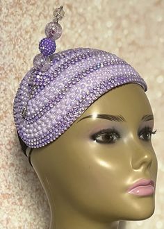 Lavender Bead Hat for Church, Wedding, Mother of the Bride, Head Covering, Tea Parties Hat is trimmed with beaded hat pin. Perfect for any special occasion. The hat measures 10X7 inches. Hat can be worn on either side of the head. All hats shipped via Free Shipping will be shipped via USPS First Class Mail. Gifts for mom, sister, wife, or yourself. Wedding Headband With Bead Caps, Elegant Beaded Headpieces For Gifts, Elegant Bead Cap Headband, Adjustable Beaded Headpiece For Wedding, Adjustable Beaded Wedding Headpieces, Handmade Purple Party Hat, Adjustable Beaded Headband For Wedding, Handmade Crown Costume Hat For Weddings, Beaded Party Costume Hats And Headpieces