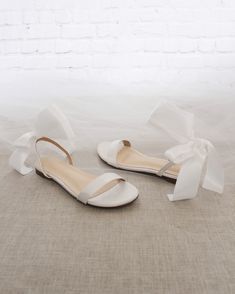 Classy satin flat sandals with wrapped satin tie. Effortless yet adorable to wear on your favorite occasion. Can be pair with dress or casual look.DETAILS:COLORS AVAILABLE: Ivory, White, Pink, Light Blue, and ChampagneUPPER: Synthetic upper and liningMATERIALS: Mandmade outsoleSTYLE NAME: MADDY Flat Bridal Shoes Sandals, Bride Flat Sandals, Grad Shoes Flats, Flat Bridal Sandals, Bridal Shoes Flats Sandals, Flat White Sandals, Wedding Flat Sandals, Flat White Shoes, Bridal Fits