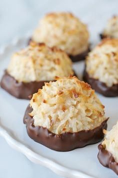 chocolate covered cookies on a white plate