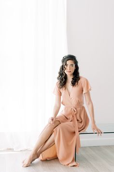 The Amalfi wrap dress is a classic style that any bridesmaid will love. When this skirt catches the breeze, our hearts are a flutter! We love wrap dresses because they fit and flatter all body types. Did we mention this dress has pockets? It has pockets! We promise you'll find many occasions to wear the Amalfi wrap dress.Custom Colour SelectionLet us know your preferred colour(s) in the note with your order. We will then confirm the colour swatch with you before starting to create your dress. Ma Flirty Bridesmaid Dress With Tie Back, Flowy Midi-length Wrap Dress With Tie Waist, Flowy Wrap Dress For Brunch, Flowy Skirt Dress For Wedding Guest, Flowy Midi Dress For Bridesmaids, Flirty Tie Back Wedding Dress, Flirty V-neck Wedding Dress, Flowy Maxi Length Faux Wrap Dress, Flowy Wrap Dress With Tie Waist