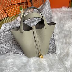 Picotin 18 vegetable basket picture sage green gold and silver spot Luxury Green Tote Bucket Bag, Luxury Green Tote Bag, Green Bucket Bag With Top Carry Handle, Green Bucket Shoulder Bag With Handle Drop, Elegant Green Bucket Bag With Handle Drop, Green Bucket Bag With Gold-tone Hardware, Basket Handbag, Hermes Picotin, Lv Purse