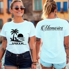 two women wearing white shirts with the words memories on them and palm trees in the background