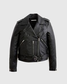 Biker chic incoming. Crafted from 100% top grain leather in a totally timeless design. This leather motorcycle jacket is unbelievably soft, and super stylish. Epaulette shoulders and robust zip details on the sleeves and pockets give it an edgy feel. Plus the pockets are spacious and usable. Fully lined with a poly satin in a slim cut, with belted hem. Read more about what makes our leather special in our Leather 101 guide.  | Quince | Women's Motorcycle Jacket in Black, Size XS, Leather Moto Leather Jacket With Zipper Closure For Work, Moto Leather Jacket With Asymmetrical Zip For Work, Chic Leather Outerwear For Biker Events, Biker Leather Jacket With Asymmetrical Zip For Work, Edgy Leather Biker Jacket With Zip Fly, Edgy Leather Jacket With Zip Fly, Biker Leather Jacket With Asymmetrical Zip, Edgy Leather Biker Jacket With Asymmetrical Zip, Sleek Black Leather Biker Jacket