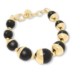 Bellezza Bronze Black Chalcedony Beaded Bracelet Dynamic vintage jewelry inspires this bracelet's metal-meets-stone design. You'll love that a classic color combo and a tapered design make the piece fab for giving outfits a tasteful dash of drama.       Approx. 7"L x 1/2"W with 1" extender      Bronze; goldtone; polished finish      Chain-link extender: lobster-claw clasp     Each bead is black chalcedony, half of which is covered with bronze overlay     Hand-assembled   Stone Information Modern Polished Beads Bracelet, Elegant Metal Bracelets With Round Beads, Elegant Metal Bracelet With Black Beads, Elegant Metal Bracelets With Black Beads, Elegant Black Bead Round Bracelets, Formal Metal Bracelets With Round Beads, Classic Gold Jewelry With Black Beads, Elegant Gold Bracelets With Large Beads, Elegant Adjustable Bracelet With Large Beads