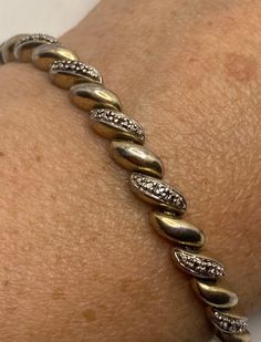 Vintage Diamond Charm Bracelet Golden 925 Sterling Silver https://www.etsy.com/listing/1201658347/vintage-diamond-charm-bracelet-golden?utm_source=crowdfire&utm_medium=api&utm_campaign=api Gold Sterling Silver Tennis Bracelet With Diamond Accents, White Gold Hallmarked Diamond Bracelet For Anniversary, Sterling Silver Diamond Bracelet With Pave Setting For Anniversary, Sterling Silver Hallmarked Bracelet For Anniversary, Hallmarked Sterling Silver Anniversary Bracelet, Hallmarked Sterling Silver Bracelet For Anniversary, Anniversary Hallmarked Sterling Silver Bracelet, Hallmarked Diamond Tennis Bracelet For Anniversary, Diamond Hallmarked Tennis Bracelet For Anniversary