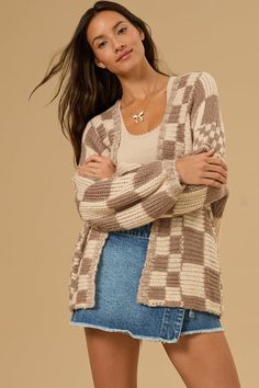 Stay warm and stylish in this cardigan. The oversized fit is perfect for layering over all your favorite outfits on those chillier days. This is an absolute must-have to have in your closet this season. Trendy Knit Sweater Coat, Trendy Soft Knit Cardigan For Loungewear, Trendy Fall Sweater Coat For Loungewear, Trendy Oversized Sweater Coat For Layering, Oversized Cozy Cardigan For Layering, Cozy Oversized Cardigan For Layering, Trendy Soft Knit Sweater Coat For Layering, Trendy Soft Knit Sweater Coat For Everyday, Casual Chunky Knit Cotton Outerwear