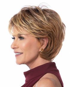 Toni Brattin Wigs Fiber: Heat-Resistant Synthetic Hair Cap Size: Average Hair Length:Front 3.5" | Crown 5" | Sides 2.5" | Back 4" | Nape 3.5" The Toni Brattin Marvelous Wig features a mid-length cut with subtle layering, lots of body, and easy styling. A great sporty yet chic, anytime look-the bangs can be worn full or Wig Outlet, Ponytail Hair Piece, Best Wig Outlet, Monofilament Wigs, Short Hair Haircuts, Short Hair With Layers, Synthetic Wig, Ponytail Hairstyles, Synthetic Wigs