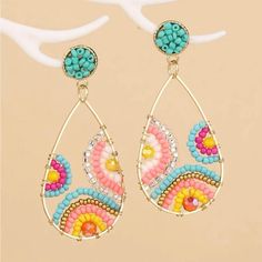 These Beautiful Woven Earrings Will Bring A Special Touch To Your Look! Nicely Made And Lightweight. High Quality!! Posts On The Earrings, Yet They Dangle! (Please Note That The Pink On The Earrings Is A Little Brighter Pink On The Bottom And Right Parts) Sku:E35 Colorful Beaded Teardrop Earrings For Beach, Teardrop Earrings With Colorful Beads For Beach, Teardrop Beach Earrings With Colorful Beads, Summer Beaded Teardrop Earrings, Beaded Teardrop Earrings For Summer, Bohemian Beaded Teardrop Earrings For Party, Bohemian Teardrop Earrings With Dangling Beads For Summer, Beach Teardrop Beaded Earrings, Teardrop Beaded Earrings For Beach