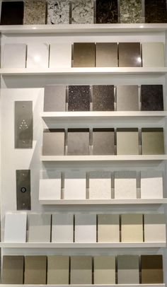 an assortment of tile samples on display in a store