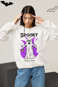 Happy Halloween ! 🎃👻 Title: Ghost Halloween Crewneck Sweatshirt , Cute Spooky Sweater , Trick Or Treat Sweatshirt ,  Pullover Halloween Party Sweater CARE INSTRUCTİONS🚿 - Machine wash: warm (max 40C or 105F) - Non-chlorine: bleach as needed - Tumble dry: medium - Do not iron on the print ; Do not dryclean. FABRIC QUALITIY🧵 Our fabric is made from 50% cotton, 50% polyester🧵 and specially spun fibers that make a very strong and smooth fabric that is perfect for printing. In this way , it prov Spooky Sweater, Halloween Crewneck Sweatshirt, Sweater Care, Halloween Crewneck, Party Sweaters, Sweatshirt Cute, Ghost Halloween, Fete Halloween, Halloween Ghosts