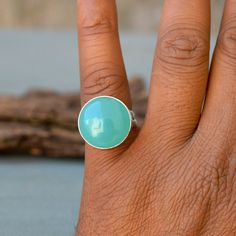 Sea Foam Green Blue Chalcedony Ring, Bezel Set Ring, Round Cab Chalcedony Ring,Gemstone Ring, Large Chalcedony Ring, Silver Yellow Gold Ring, Native=01 Size/Dimension (Approx) : All Sizes Available Gemstone : Chalcedony Stone Shape : Round Stone Size (Approx) : 18 mm Stone Color : Green Blue Please Note - Because you use natural good quality hand-selected gemstones Therefore, Colors and Inclusions of the Stone may Vary. I will Choose a Gorgeous Stone for You. Please Convo Us For Gemstone Customi Round Chrysoprase Opal Ring, Round Opal Chrysoprase Ring, Turquoise Crystal Round Ring, Oval Green Chalcedony Rings, Turquoise Chalcedony Gemstone Rings, Classic Chalcedony Ring Jewelry, Formal Handmade Chalcedony Rings, Silver Oval Chalcedony Rings, Blue Chalcedony Cabochon Rings