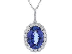 5.50ct Oval Blue Tanzanite With 1.00ctw Round White Diamond Rhodium Over 14k White Gold Pendant With 18" Cable Chain. Measures Approximately 1.04"L x 0.57"W. Lobster Claw Clasp. Jump Ring at 16". Gia Certified Dazzling Tanzanite Jewelry, Oval Tanzanite White Gold Jewelry, Fine Jewelry Tanzanite Oval Jewelry, Fine Jewelry With Oval Tanzanite, School Jewelry, White Gold Pendant, Blue Tanzanite, Popular Jewelry, Pendant With Chain