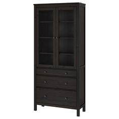 a tall wooden cabinet with glass doors on the top and bottom drawers in dark brown