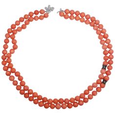 A luxurious necklace, featuring two strands of genuine salmon coral beads, accented with white gold and diamond spacers & accents, and secured with a white gold and diamond butterfly clasp. Accentuate your beauty with timeless style! Hallmarks: 14K, 585 Butterfly clasp approx 18mm x 13mm, box clasp closure with snap fastener Shortest strand length approx 65cm Bead diameter ranges from 9.5mm to 10.4mm Diamond encrusted spacers approx 7.25mm by 6.85mm Diamond Knot, Graduation Necklace, Coral Beads, Multi Strand Necklace, Multi Strand, Gold Beads, Live Lokai Bracelet, Vintage Jewelry, Gold Necklace