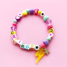 A super cute mix of quality acrylic pastel beads  in all the candy colours, complete with a neon acrylic lightning bolt charm and stainless steel star charm. Can be personalised with any name or word. Available in 4 different sizes. Trendy Birthday Charm Bracelet, Playful Multicolor Personalized Charm Bracelet, Trendy Pink Charm Bracelet With Letter Beads, Playful Letter Beads Charm Bracelet For Birthday, Playful Charm Bracelet With Letter Beads For Birthday, Playful Pink Letter Beads Charm Bracelet, Playful Multicolor Charm Bracelet With Letter Beads, Playful Letter Beads Charm Bracelet For Friendship, Playful Customized Name Bracelet