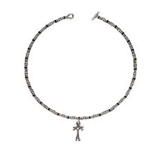 This stunning silver necklace features a delicate chain adorned with intricate starburst-shaped links and a prominent Gothic-style cross pendant. Its detailed craftsmanship adds a bold yet elegant statement to any outfit. Perfect for those who love unique and stylish accessories, this piece can complement both casual and formal looks. The cross pendant gives it a subtle vintage and religious touch, making it ideal for fashion enthusiasts who enjoy mixing classic and modern elements. silver neckl Cheap Black Beaded Chain Necklaces, Cheap Metal Emo Necklace, Thirteen Movie Cross Necklace, Cheap Black Y2k Style Jewelry, Affordable Y2k Style Necklaces, Cheap Black Y2k Jewelry, Cheap Y2k Style Necklaces For Gift, Cheap Adjustable Y2k Style Necklaces, Cheap Adjustable Y2k Style Necklace