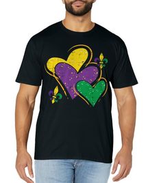 PRICES MAY VARY. Grab this funny Mardi Gras Hearts T-Shirt as a fancy costume for Mardi Gras, Fat Tuesday Parade or Birthday Party gift! Wear this carnival outfit for men, women, ladies, adults, kids, teens, boys, girls and let the good times roll! Laissez les bons temps rouler! Wear this funny Mardi Gras Hearts T-Shirt at Mardi Gras in New Orleans Louisiana with your Jester mask and beads! Browse our brand for purple green yellow carnival costume clothes for men, women and kids Lightweight, Cla Fun Valentine's Day Tops With Graphic Print, Fun Letter Print T-shirt For Valentine's Day, Fun Crew Neck T-shirt With Heart Graphic, Fun Heart Graphic Crew Neck T-shirt, Fun Short Sleeve T-shirt For Valentine's Day, Black Short Sleeve T-shirt For Valentine's Day, Fun Valentine's Day T-shirt With Short Sleeves, Valentine's Day Fun Short Sleeve T-shirt, Jester Mask