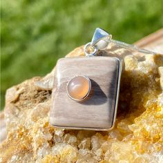 Artisan Designed Genuine Petrified Wood, Peach Moonstone And 925 Sterling Silver Pendant Necklace Stamped 925 19.25 Inches Including Pendant Nwot Silver Sunstone Jewelry For Gift, Silver Sunstone Jewelry As A Gift, Silver Sunstone Jewelry With Gemstone, Silver Sunstone Jewelry With Natural Stones, Peach Moonstone, Moonstone Necklace, Artisan Design, Petrified Wood, Sterling Silver Necklace Pendants