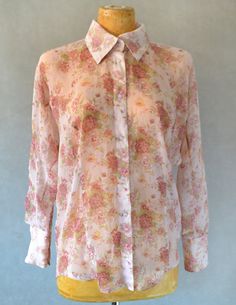 This stunning blouse is great for dressing up or dressing down.  Complete with a unique back yolk detail and three button cuff closure.  Size L Womens Blouses, Floral Button Up, Button Up Blouse, Dec 12, Anaheim, Dressed Down, Womens Clothing Tops, Blouses For Women, Button Up