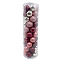 a clear tube filled with red and silver christmas bauble ornament balls