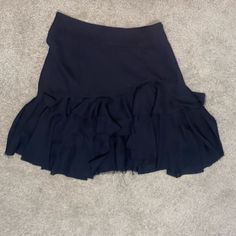 Never Worn Waist Size 24 00-0 Black Flowy Skirt Black Flared Skort With Ruffled Detail, Black Ruffled Skort In Short Length, Black Ruffled Flared Skort, Black Tiered Skirt For Workwear, Black Tiered Skirt For Work, Black Relaxed Fit Tiered Skort, Black Asymmetrical Lined Skort, Black Asymmetrical Pleated Skort, Black Pleated Asymmetrical Skort