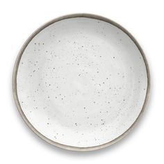 a white bowl with speckles on it