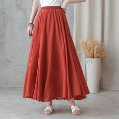 "you can wear it as a casual skirt for travelling, having a picnic with your friends, dating and shopping, Perfect for lazy days that you want to sustain a chic and stylish appearance. DETAIL * 75% linen, 25% cotton * Cotton liner * Elastic waistband * Without pockets * pleated waist detail * Plus size skirt * Circle skirt * Perfect summer spring skirt * Dry clean * The model is 170cm (5′7″) tall with a 80cm (31.5\") bust, 66cm (26\") waist. She is wearing the skirt in size XS/S in red (color 1) Beach Flared Skirt Solid Color, Bohemian Long Skirt In Solid Color, Beach Long Skirt Solid Color, Long Solid Color Beach Skirt, Bohemian Gathered Skirt In Solid Color, Bohemian Gathered Skirt Solid Color, Bohemian Solid Color Gathered Skirt, Casual Non-stretch Full Maxi Skirt, Bohemian Wide Leg Solid Color Skirt