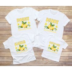 Get ready to zest up your family celebrations with our Lemon Birthday Family Party T-Shirts! 🍋 Mommy and Daddy will be squeezing out the love in style with their matching shirts, proudly declaring their roles in this citrus-filled affair. 🎉 And for the littlest member of the bunch, our Sweet One and Main Squeeze shirts are perfect for the main attraction - after all, it's their big day! 🍼 But let's not forget about the siblings! The brother and sister shirts add an extra splash of sweetness t White Summer T-shirt For Family Events, Family Matching T-shirt For First Birthday, Family Matching Custom Print T-shirt For First Birthday, Playful Summer Family T-shirt, Fun Yellow Top For Birthday, Playful T-shirt For First Birthday In Spring, Family Matching T-shirts For Summer, Playful Family T-shirt For Summer, Playful Summer T-shirt For Family Events