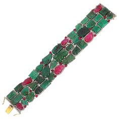 A stunning statement cuff handmade in 14K gold. It is hand set in carved motifs throughout, 129.82 carats emerald, 31.08 carats ruby & 5.36 carats of sparkling diamonds. Clasp Closure FOLLOW MEGHNA JEWELS storefront to view the latest collection & exclusive pieces. Meghna Jewels is proudly rated as a Top Seller on 1stDibs with 5 star customer reviews. All items manufactured by us are handmade and can be customized or redesigned. Composition Gold Weight(Gms)-4.69 Silver Weight-42.54 Diamond Wt(Ct Carved Emerald, Diamond Cuff Bracelet, Gold Bracelet Cuff, Ruby Diamond, Pearl Diamond, Vintage Jewels, Emerald Diamond, Sparkle Diamonds, Beautiful Bracelet