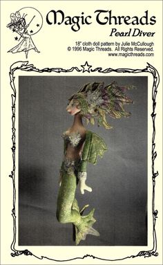 an image of a mermaid doll with green hair and tail, in front of a black background