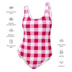 Get ready to rock your summer look with our classic Cherry Red, White and Pink Preppy Gingham One Piece Swimsuit! This adorable swimsuit is designed to flatter all shapes and sizes, while the silky smooth material adds an extra touch of luxury. Whether you're at the beach or pool, this swimsuit will have you feeling Extremely Stoked! • 82% Polyester, 18% Spandex • Chlorine-resistant fabric • Cheeky fit with a scoop neckline and a low scoop back • Zig-zag stitching • Double-layer front • Four-way Spring Gingham One-piece Swimwear, Gingham Swimwear For Sunbathing During Beach Season, Plaid Swimwear For Summer Vacation, Gingham Swimwear For Summer Beach, One-piece Gingham Swimwear For Summer, Summer Gingham One-piece Swimwear, Fitted Gingham Sleeveless Swimwear, Fitted Sleeveless Gingham Swimwear, Plaid Summer Swimwear