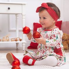 "Baby & toddler girl's super soft and comfortable bamboo blend long sleeve dress in our Xmas tree print with red trim. Dress has a shoulder ruffle and buttons in the back for easy on and off. This listing is for 1 dress only. The optional headband completes the outfit. Send your gift in our special gift bag. It's 100% all-natural linen and reusable keepsake. Just order this along with your gift and we'll take care of the rest! https://www.etsy.com/listing/255879923/gift-bag-add-on-for-your-order Cute Long Sleeve Holiday Dress For Festive Occasion, Cute Long Sleeve Festive Holiday Dress, Cute Christmas Playtime Dress, Cute Christmas Playtime Dresses, Playful Long Sleeve Christmas Dress, Cute Long Sleeve Christmas Holiday Dress, Red Christmas Playtime Dress, Playful Long Sleeve Holiday Dress, Baby Girl Christmas Dress