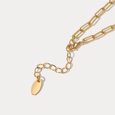 This exquisite 18K gold on brass Heart Lock and Key Necklace is designed to evoke the romantic mystery of a classic fairytale. Crafted with careful attention to detail, it will become a timeless addition to your jewelry collection. An effortless accessory with which to enchant, this luxurious necklace will be your go-to for timeless elegance. DETAILS Plating: 18K Gold Materials: 18K Gold on Brass, Cubic Zirconia Measurements: Length: 17.83"(45.3cm) + Extender: 1.97"(5.0cm) Weight: 13.55g Gold Clavicle Chain Link Necklace, Elegant Heart Pendant Locket Necklace With Adjustable Chain, Heart-shaped Gold-tone Charm Necklace With Adjustable Chain, Gold-tone Gold Plated Pendant Locket Necklace, Gold-tone Pendant Locket Necklace, Elegant Brass Heart Necklace, Elegant Heart-shaped Brass Necklace, Gold Plated Chain Necklace With Adjustable Chain For Wedding, Gold Clavicle Chain Link Charm Necklaces