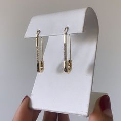 14k goldfill safety pin earrings Everyday Safety Pin Single Earring, Minimalist Safety Pin Jewelry For Pierced Ears, Safety Pin Shaped Earrings With Ear Wire, Gift Safety Pin Shaped Single Earring, Safety Pin Earrings As Gift, Gold Safety Pin Earrings For Everyday, Single Safety Pin Earring, Minimalist Safety Pin Earrings, Minimalist Gold Safety Pin Earrings