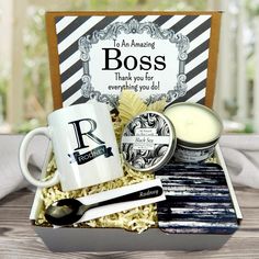 a gift box containing coffee, candles and personal care items for someone's special occasion